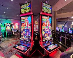 Antarmuka mobile xlslot88 menampilkan permainan Reactoonz dan opsi pembayaran